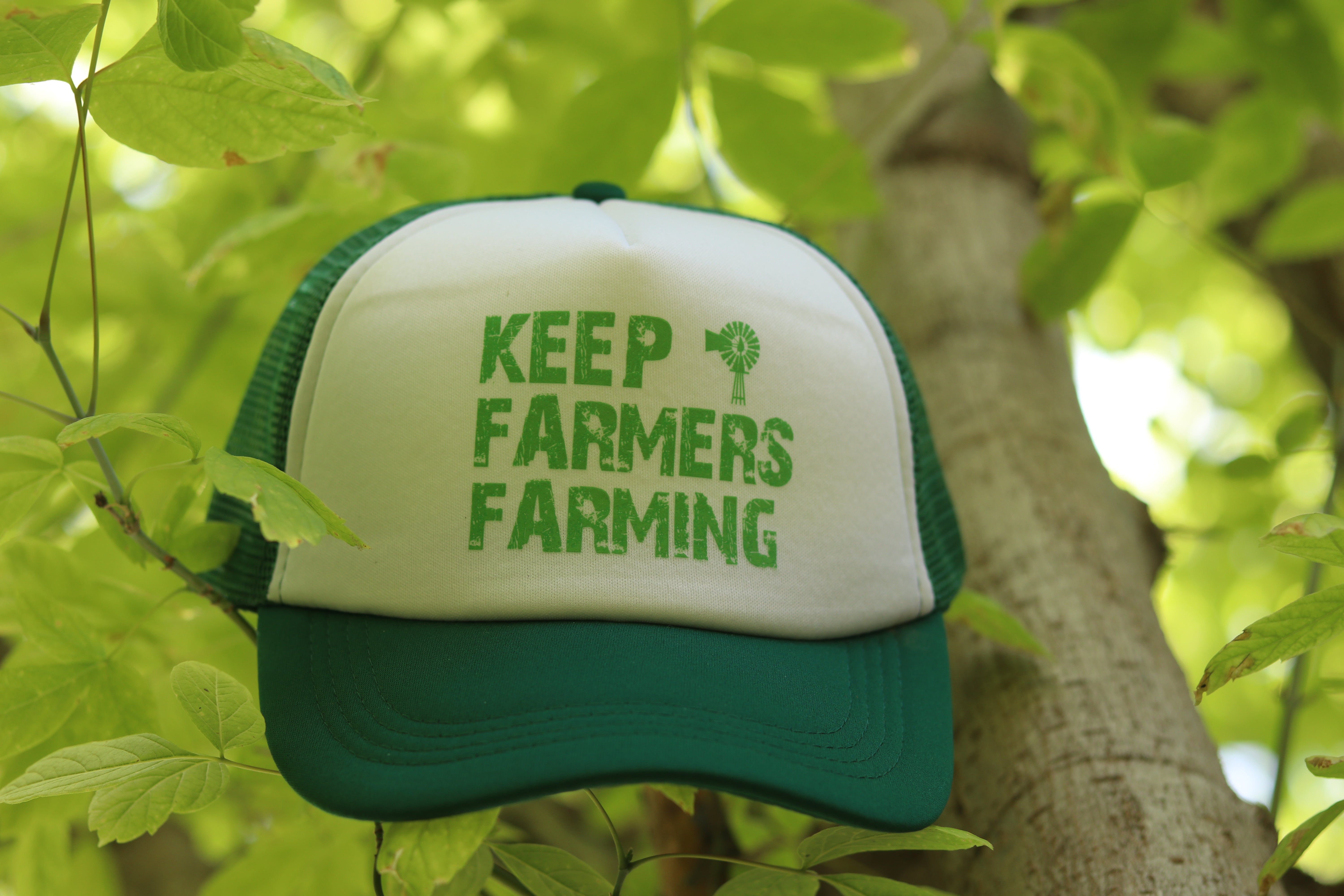 Keep Farmers Farming trucker hat